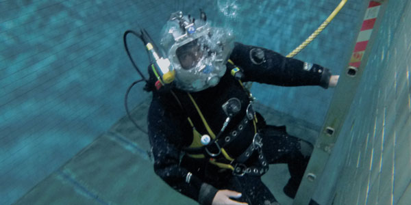 Industrial diver with the Tatum diving helmet 